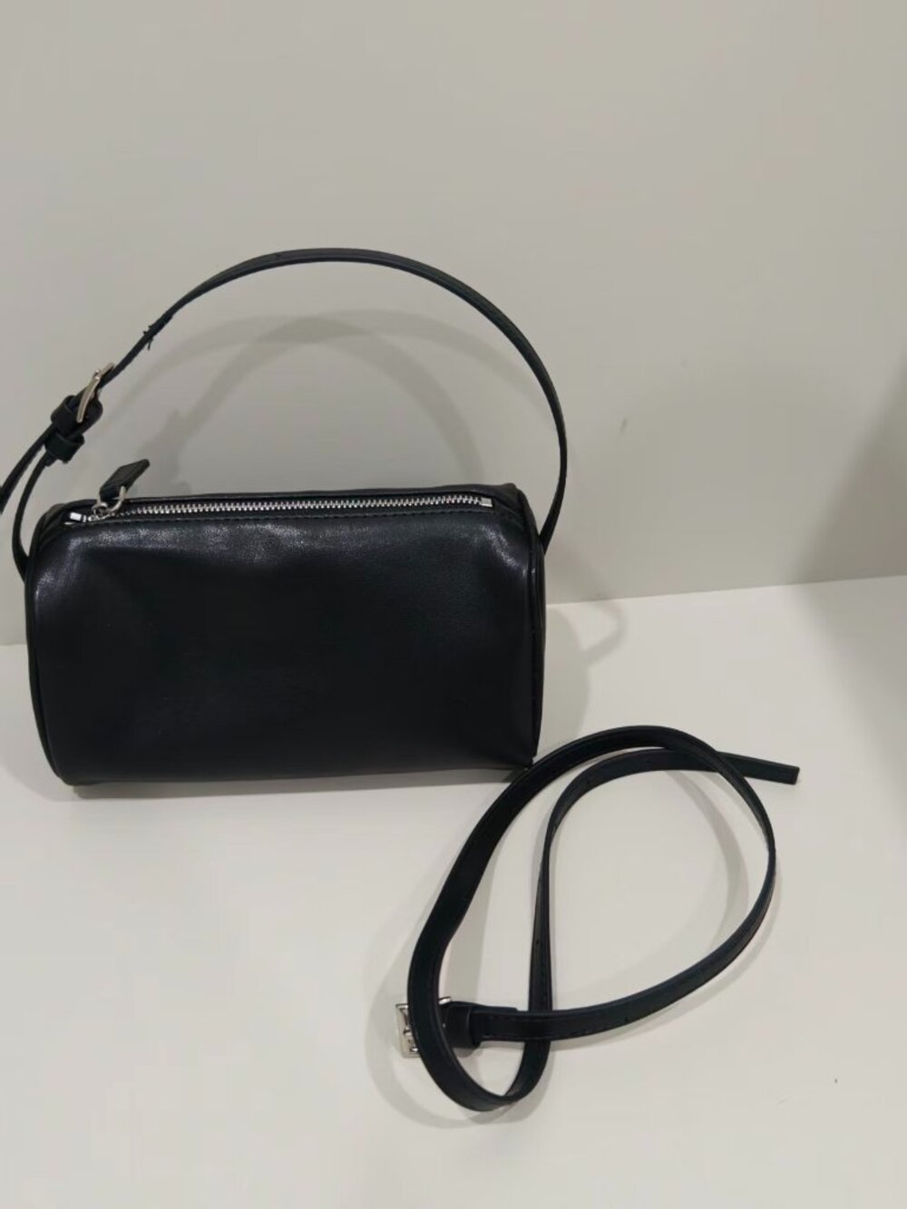 The Row Black Leather Cylinder Barrel Shoulder Bag